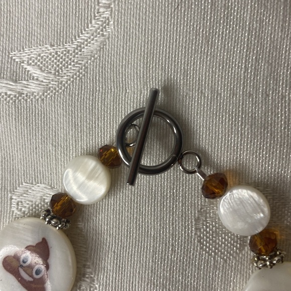 Handcrafted Shell and Crystal Poo Emoji Bracelet - Picture 6 of 6